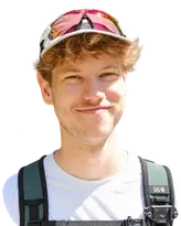 Hendrik wearing a cap and backpack